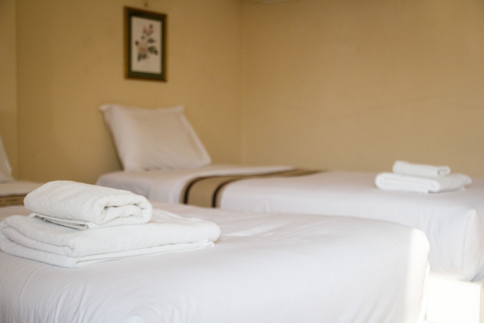 Imagen de la habitación del Hotel Triple Palms House. Foto 5