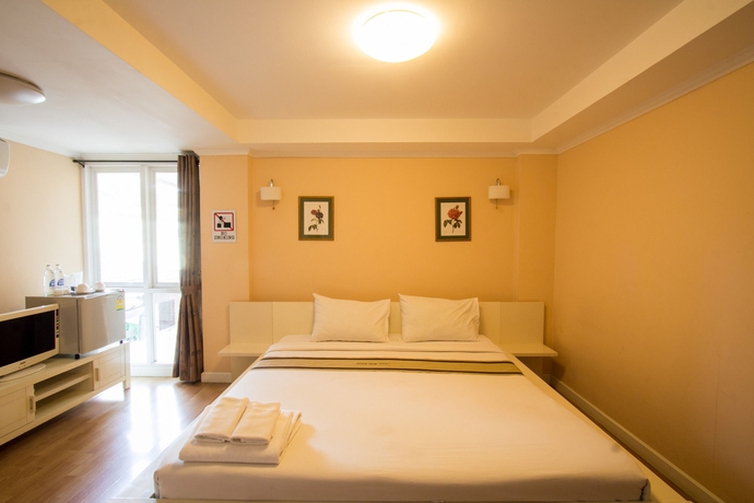 Imagen de la habitación del Hotel Triple Palms House. Foto 6