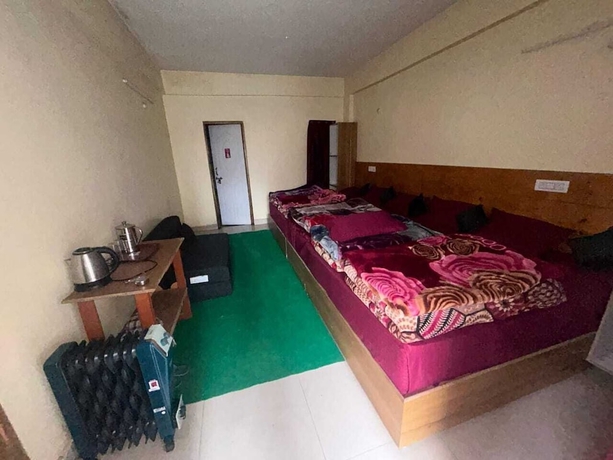 Imagen de la habitación del Hotel Triple S Residency. Foto 1