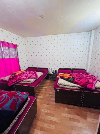 Imagen de la habitación del Hotel Triple S Residency. Foto 9