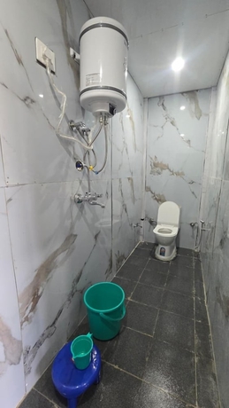 Imagen de la habitación del Hotel Triple S Residency. Foto 14