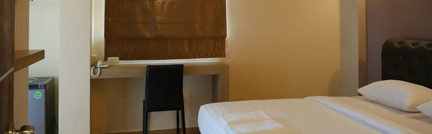 Imagen de la habitación del Hotel Triple Trees. Foto 4