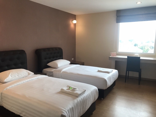 Imagen de la habitación del Hotel Triple Trees. Foto 5