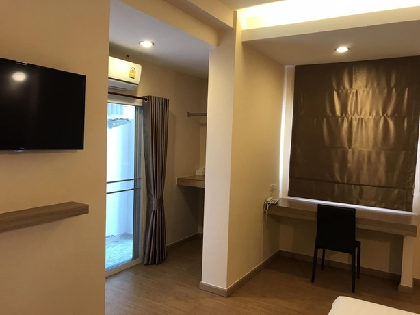 Imagen de la habitación del Hotel Triple Trees. Foto 8