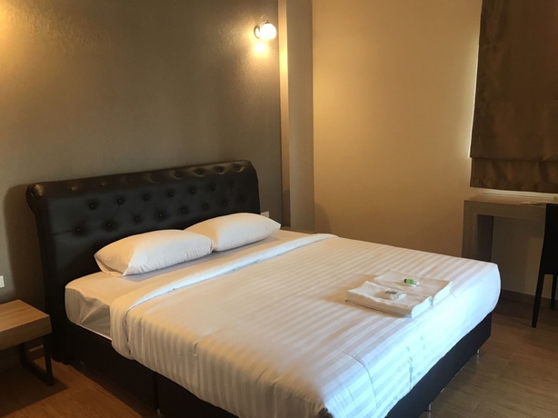 Imagen de la habitación del Hotel Triple Trees. Foto 9