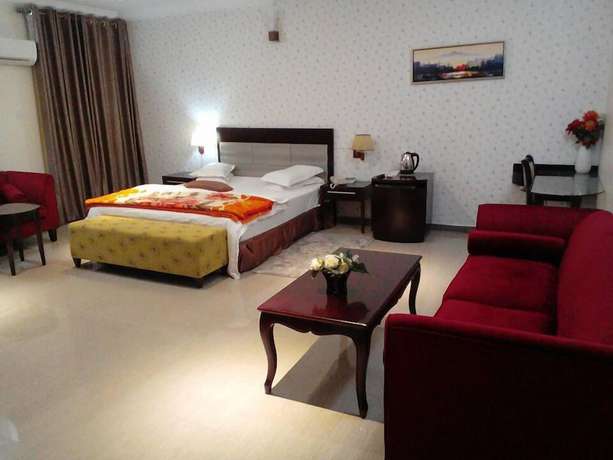 Imagen de la habitación del Hotel Triple Trees. Foto 8