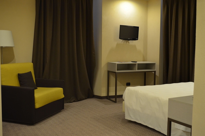 Imagen de la habitación del Hotel Tripoli, Desenzano del Garda. Foto 5