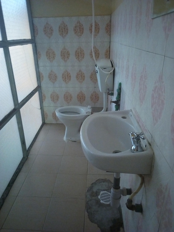 Imagen de la habitación del Hotel Tripple M Guest House. Foto 11