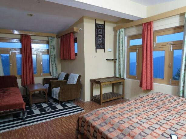 Imagen general del Hotel Trishul Orchard Resort. Foto 3