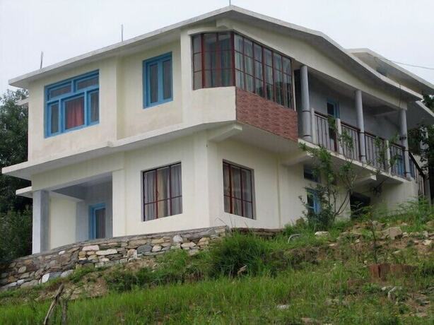 Imagen general del Hotel Trishul Orchard Resort. Foto 4