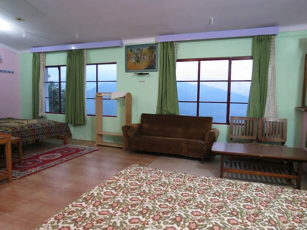 Imagen general del Hotel Trishul Orchard Resort. Foto 8