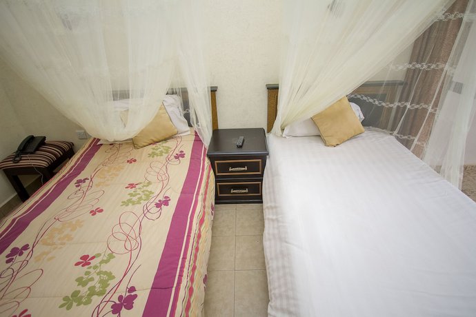Imagen de la habitación del Hotel Tristar, Bugolobi. Foto 17