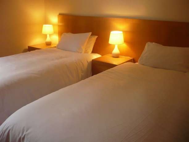 Imagen de la habitación del Hotel Tri-star. Foto 10