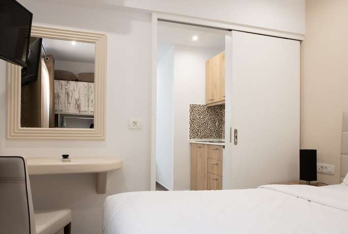 Imagen de la habitación del Hotel Tristhenia. Foto 5