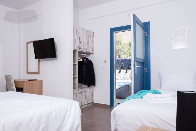 Imagen de la habitación del Hotel Tristhenia. Foto 7