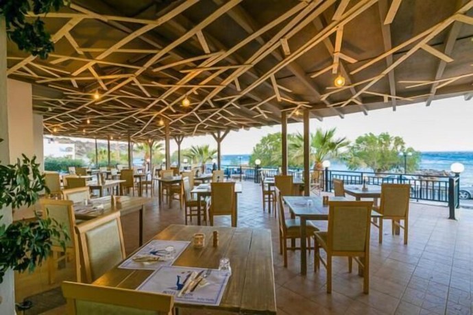 Imagen del bar/restaurante del Hotel Triton Authentic Cretan. Foto 3
