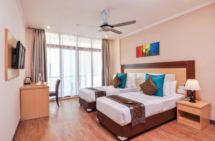 Imagen de la habitación del Hotel Triton Beach and Spa. Foto 2