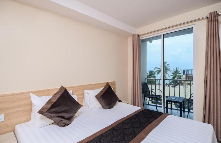 Imagen de la habitación del Hotel Triton Beach and Spa. Foto 8