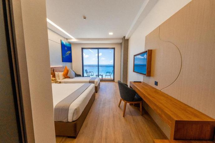 Imagen de la habitación del Hotel Triton Exotica. Foto 2