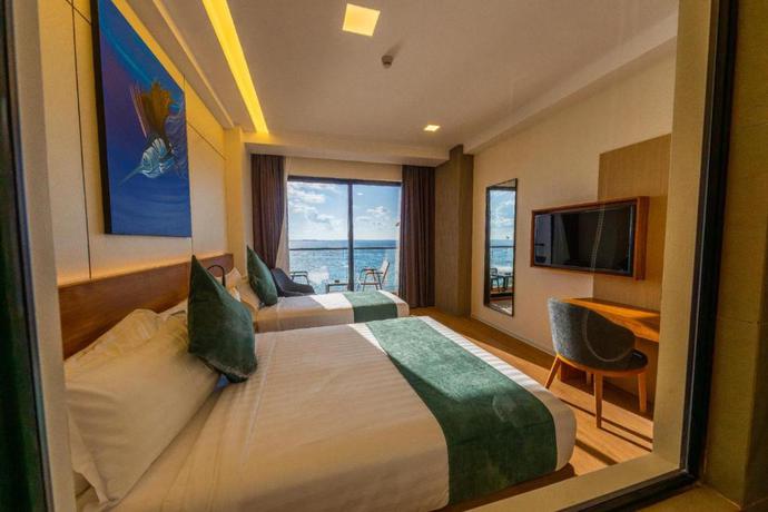 Imagen de la habitación del Hotel Triton Exotica. Foto 3