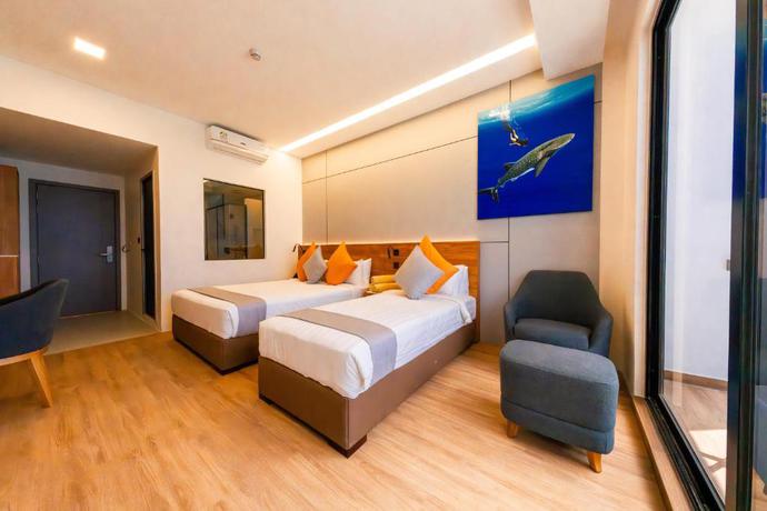 Imagen de la habitación del Hotel Triton Exotica. Foto 5