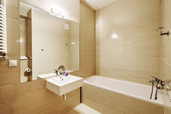 Imagen de la habitación del Hotel Triton Park Apartments. Foto 4