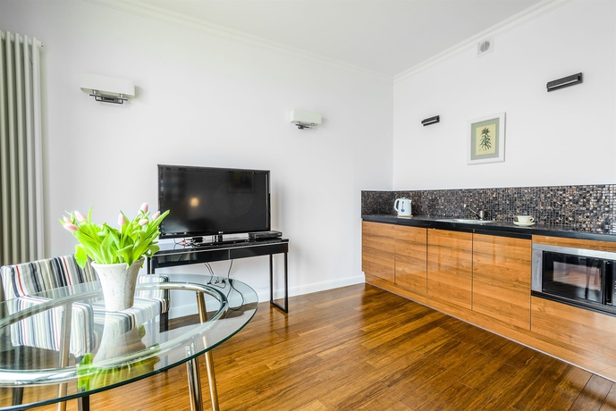 Imagen de la habitación del Hotel Triton Park Apartments. Foto 7