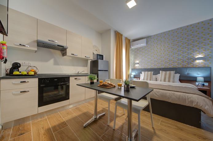 Imagen de la habitación del Hotel Tritoni Marina Apartments and Suites. Foto 4