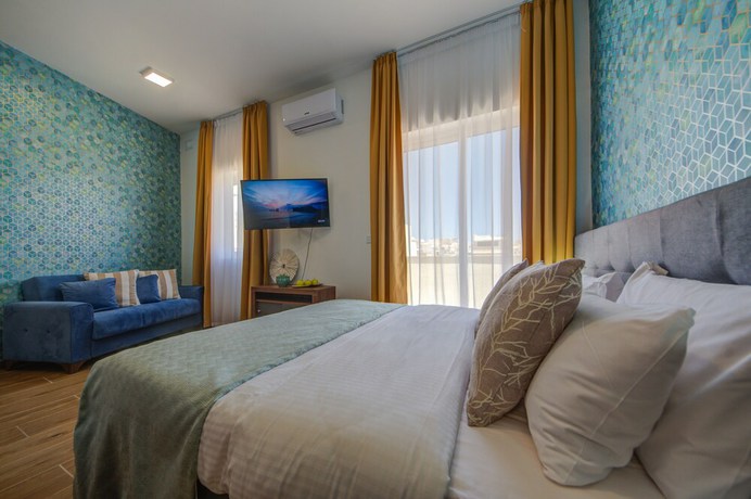 Imagen de la habitación del Hotel Tritoni Marina Apartments and Suites. Foto 6