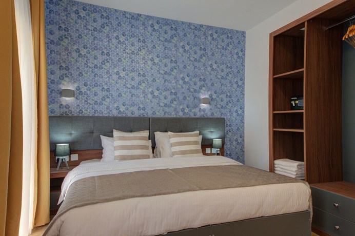 Imagen de la habitación del Hotel Tritoni Marina Apartments and Suites. Foto 8