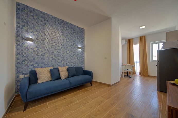 Imagen de la habitación del Hotel Tritoni Marina Apartments and Suites. Foto 11