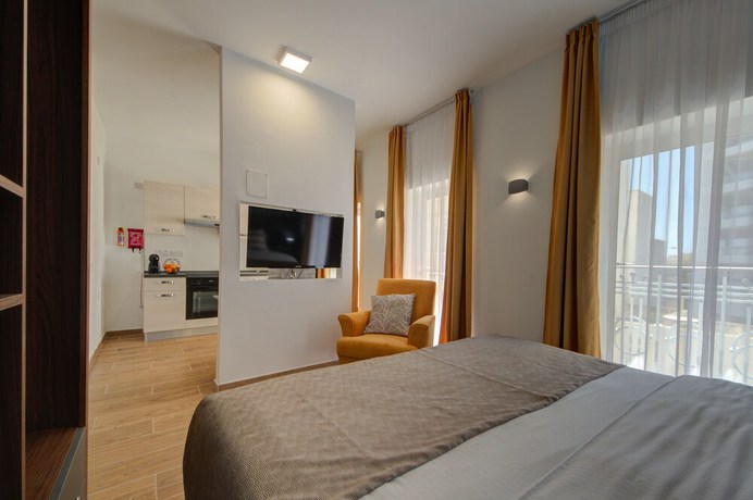Imagen de la habitación del Hotel Tritoni Marina Apartments and Suites. Foto 13