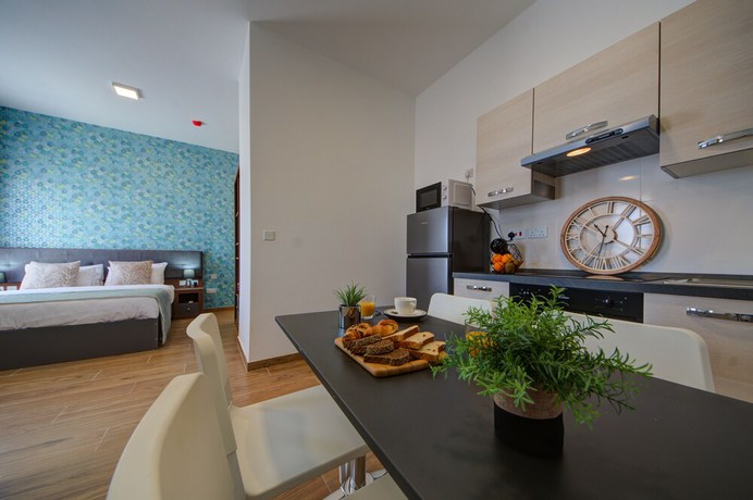 Imagen de la habitación del Hotel Tritoni Marina Apartments and Suites. Foto 14