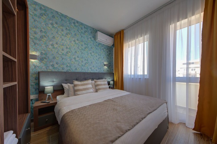 Imagen de la habitación del Hotel Tritoni Marina Apartments and Suites. Foto 16