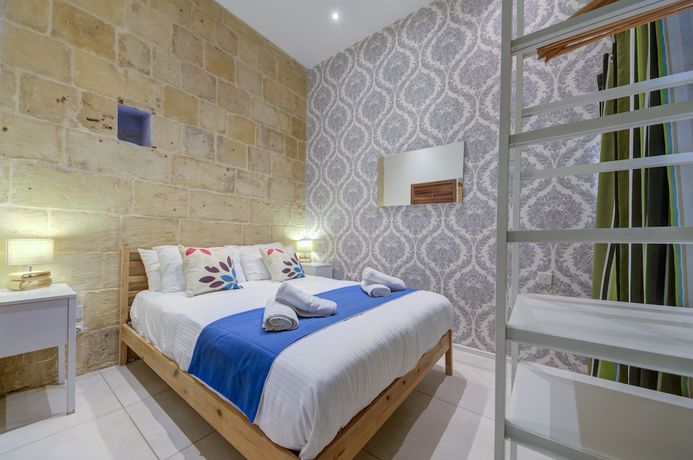 Imagen de la habitación del Hotel Tritoni harbour suites. Foto 2