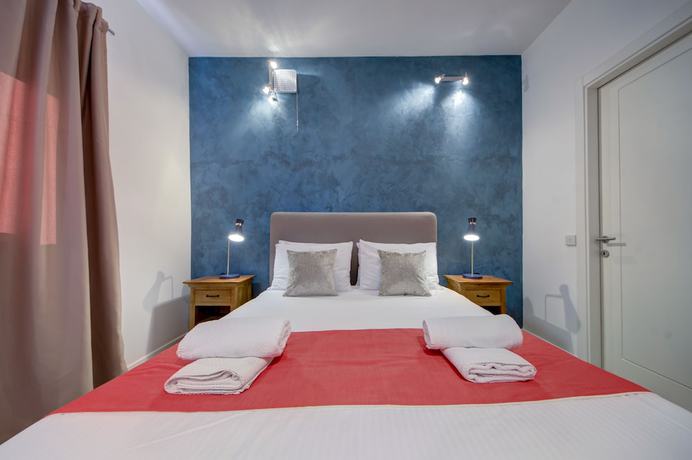 Imagen de la habitación del Hotel Tritoni harbour suites. Foto 5