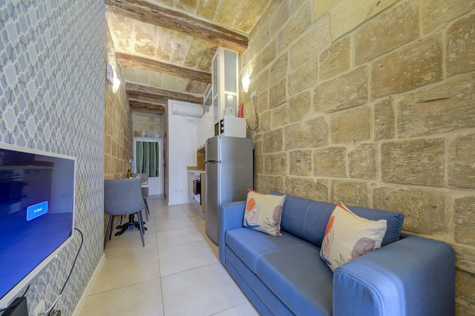 Imagen de la habitación del Hotel Tritoni harbour suites. Foto 8