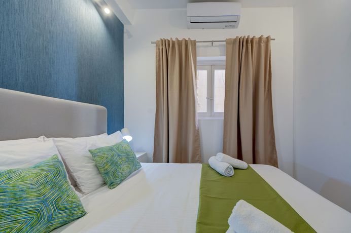 Imagen de la habitación del Hotel Tritoni harbour suites. Foto 16