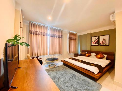 Imagen de la habitación del Hotel Triệu Nguyễn. Foto 17