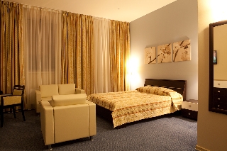 Imagen de la habitación del Hotel Triumph Hotel. Foto 5