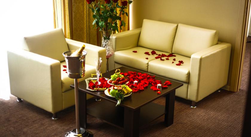 Imagen de la habitación del Hotel Triumph Hotel. Foto 8