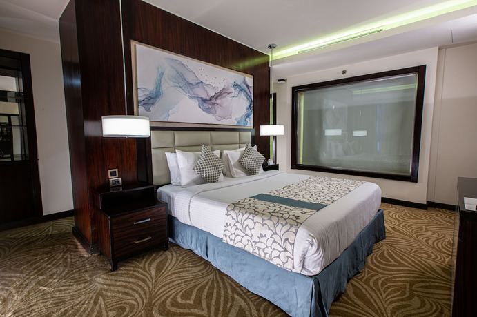 Imagen de la habitación del Hotel Triumph Luxury. Foto 16