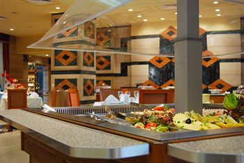 Imagen del bar/restaurante del Hotel Triumph Plaza. Foto 4