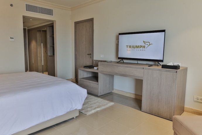 Imagen de la habitación del Hotel Triumph White Sands. Foto 5