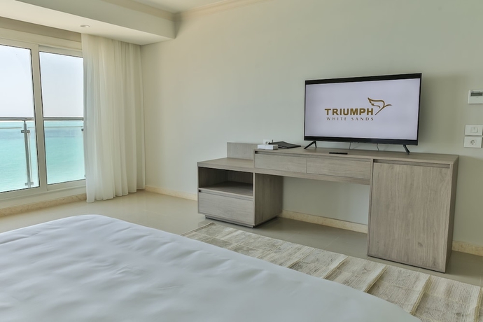 Imagen de la habitación del Hotel Triumph White Sands. Foto 8