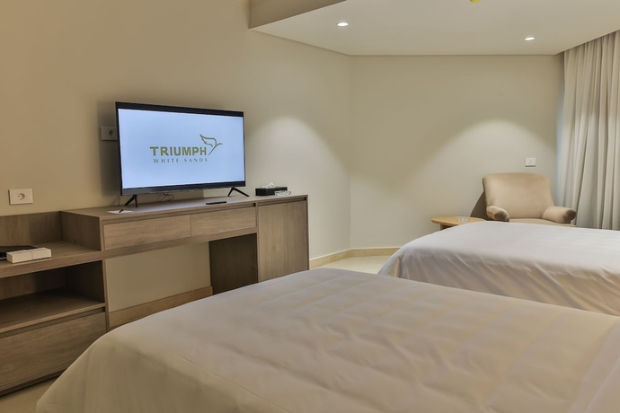 Imagen de la habitación del Hotel Triumph White Sands. Foto 9