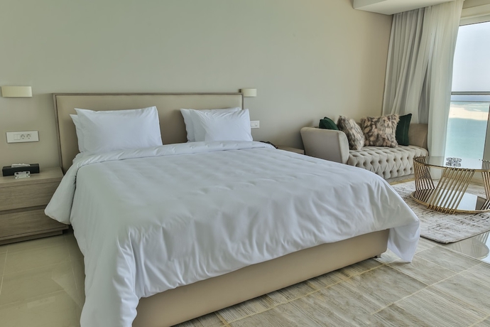 Imagen de la habitación del Hotel Triumph White Sands. Foto 12