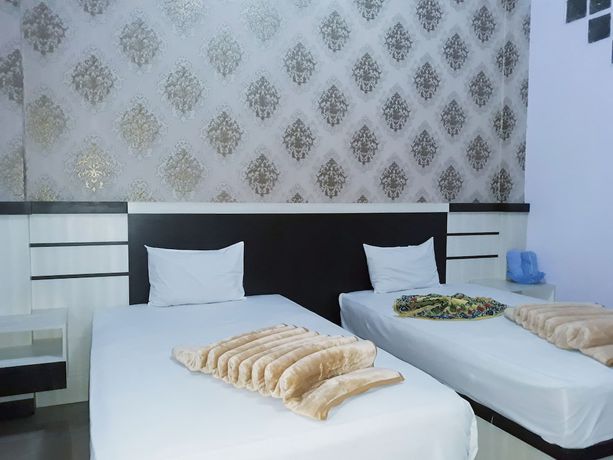 Imagen de la habitación del Hotel Trivadoh Syariah. Foto 3