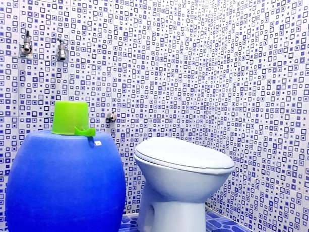 Imagen de la habitación del Hotel Trivadoh Syariah. Foto 4