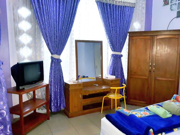 Imagen de la habitación del Hotel Trivadoh Syariah. Foto 6